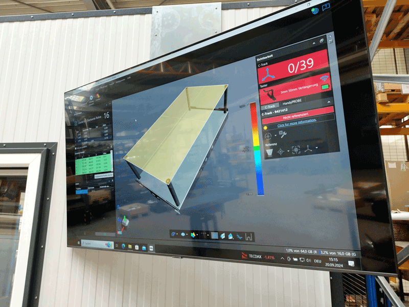Una captura de pantalla del software Creaform.OS mostrando el modelo 3D de un componente metálico.
