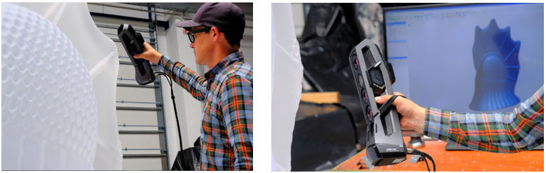 Un uomo scansiona una scultura bianca con lo scanner Go!SCAN SPARK. Braccio con lo scanner Go!SCAN SPARK, in secondo piano schermo con scansione.