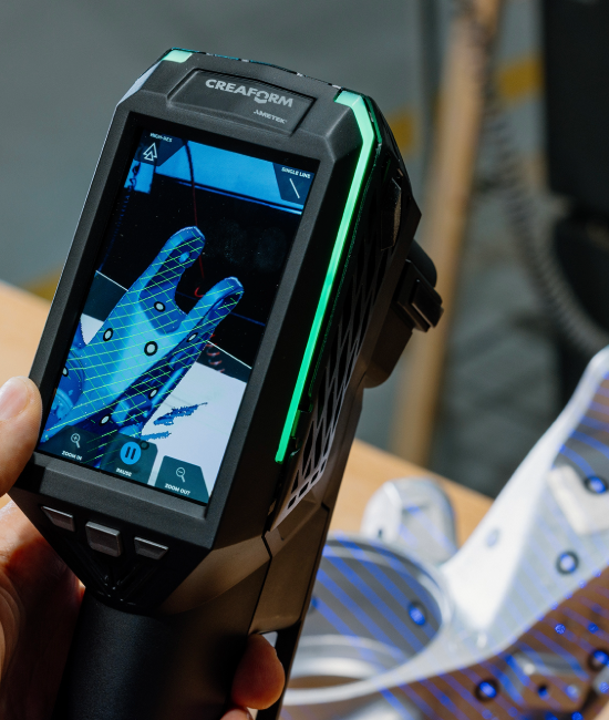 EVO Series 3D scanner displaying mesh generation and Augmented Reality mode on screen on a casting part.